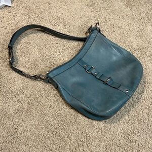 Blue colored leather coach shoulder bag.